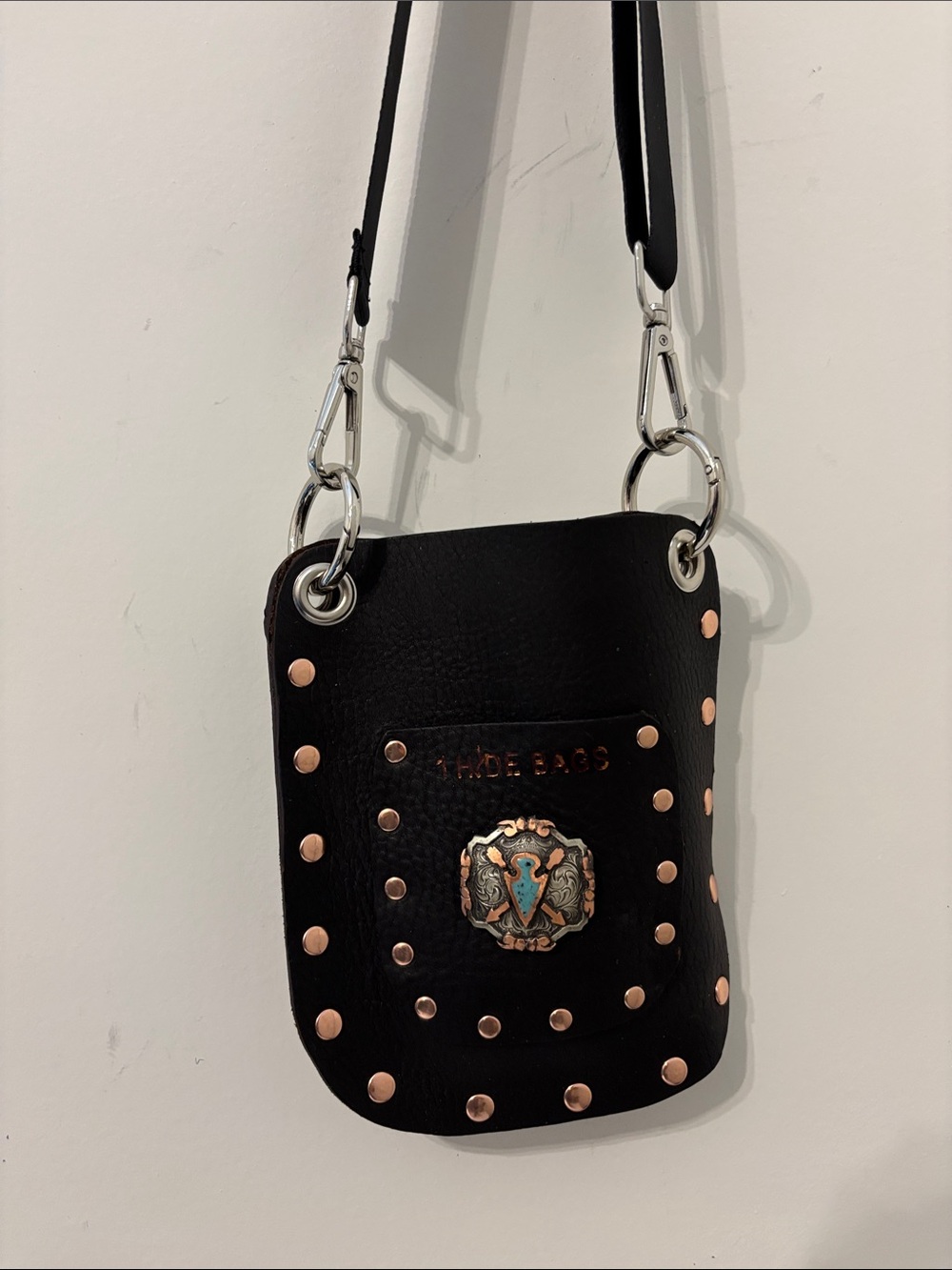 Black Studded Crossbody Pouch with Decorative Medallion